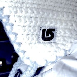 Like new ivory and baby blue beanie hat! Adorable has baby blue tassels to tie